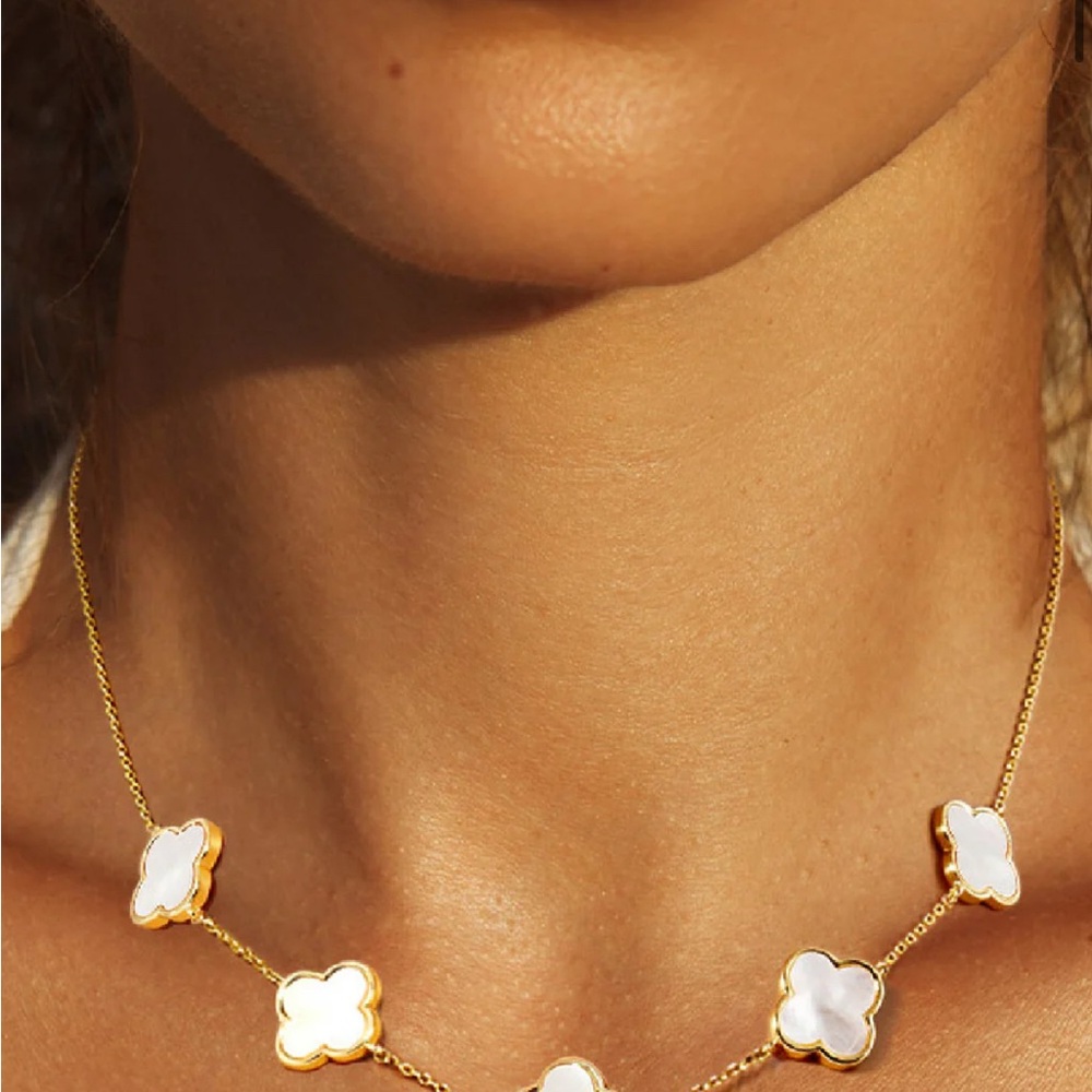 Elegant Gold and White Clover Necklace